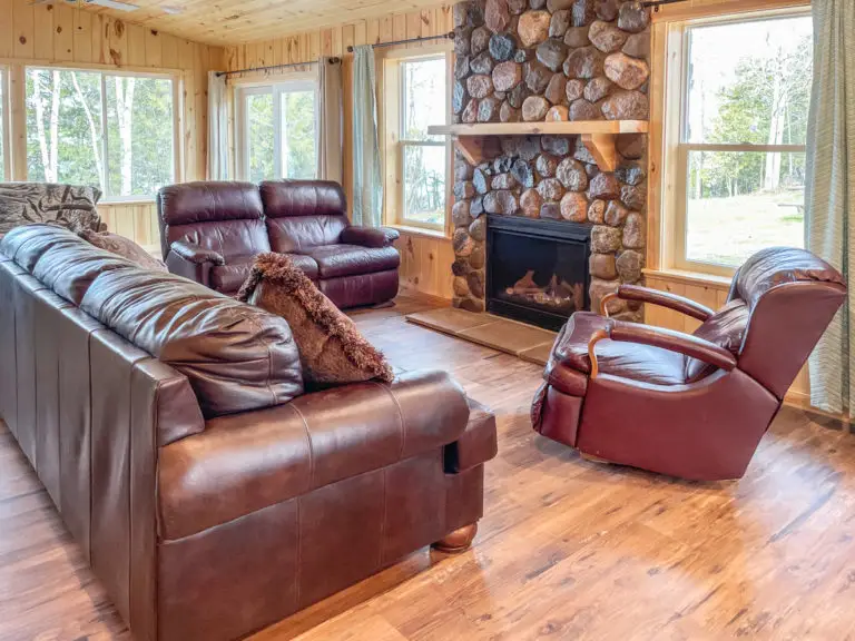 cabin interior with stone fireplace